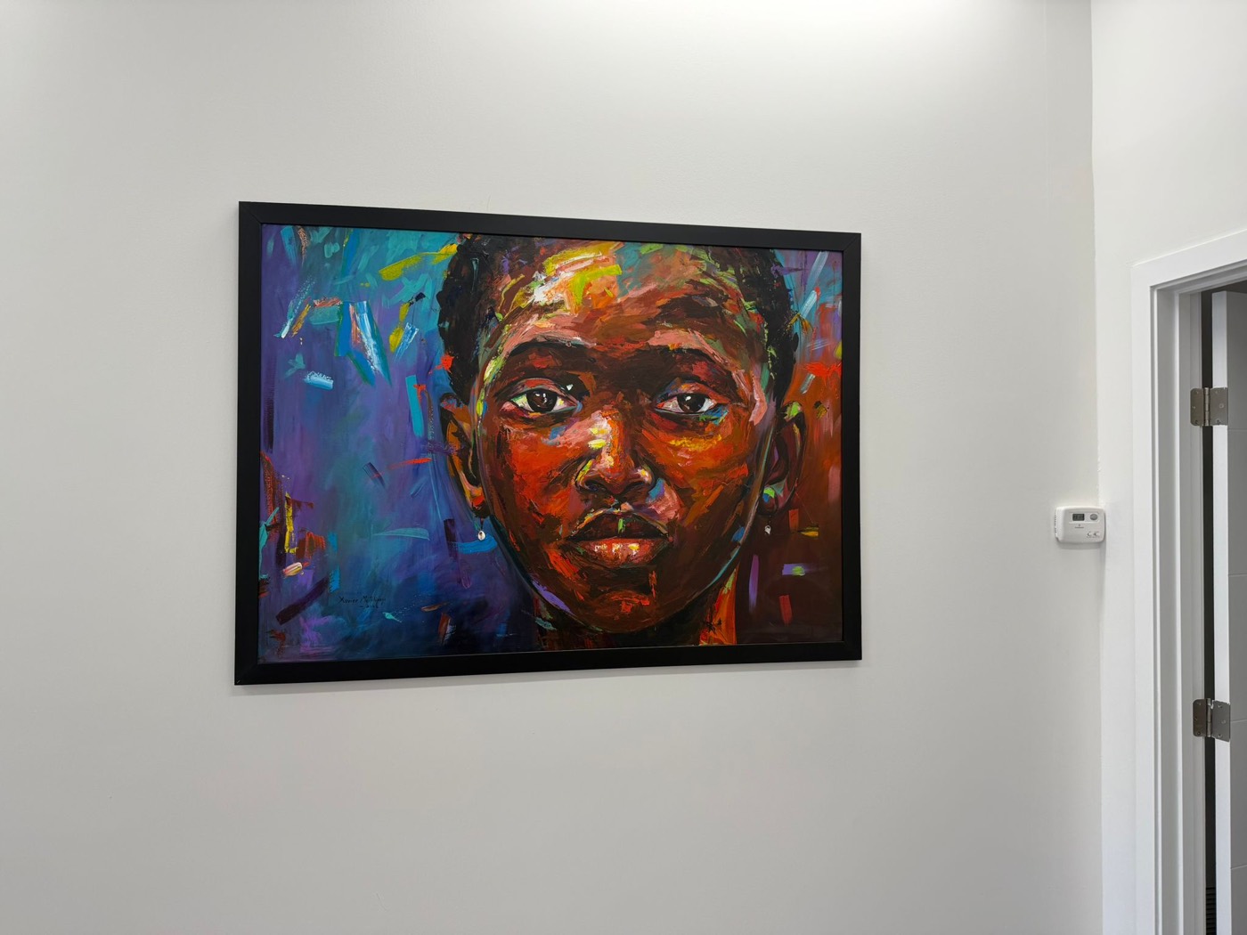 Artwork on display at the Kwilu Law Chamber office